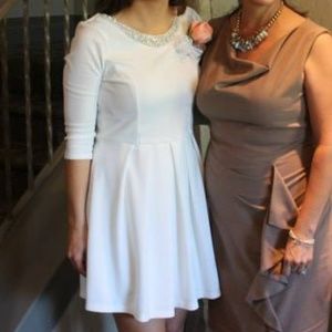 White bridal boutique dress with jeweled collar